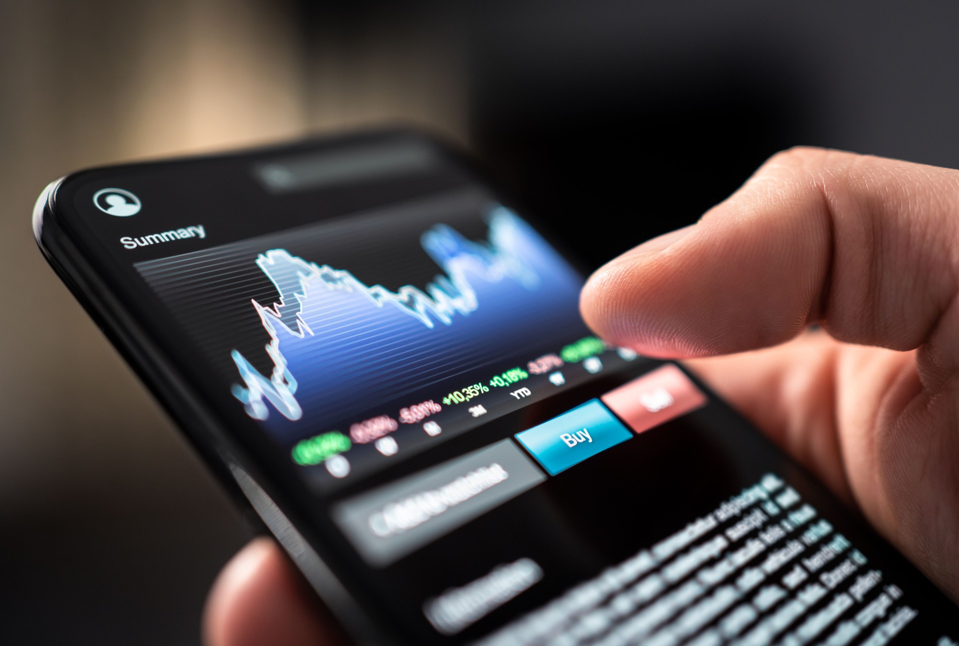 Stock market trade with phone. Finance analysis graph and chart in crypto currency, forex, index fund or etf mobile app. Stockmarket broker and investor holding smartphone in hand.